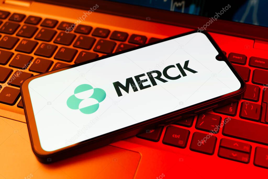 Prague, Czechia - 02 21 2025: Laptop on surface showing Merck logo.