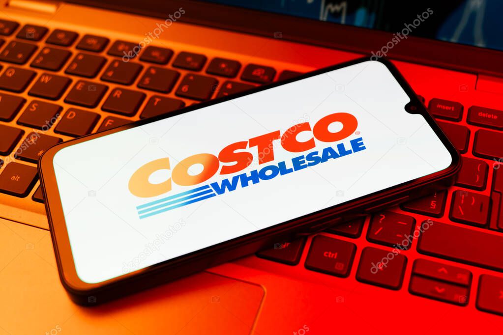 Prague, Czechia - 02 21 2025: Laptop on surface showing Costco logo.