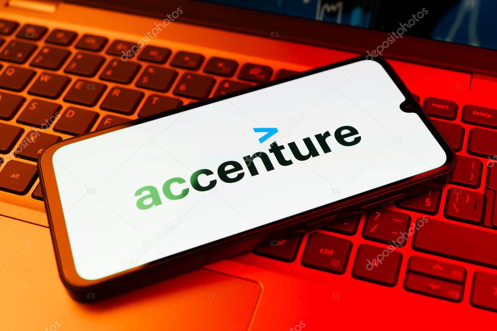 Prague, Czechia - 02 21 2025: Laptop on surface showing Accenture logo.