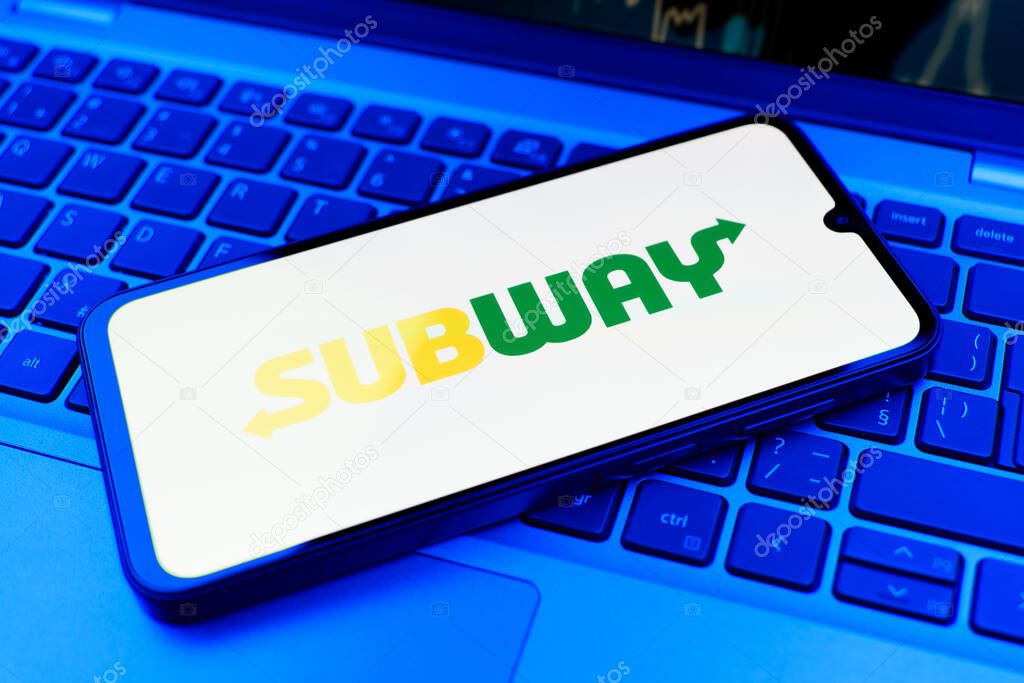 Prague, Czechia - 02 21 2025: Laptop on surface showing Subway logo.