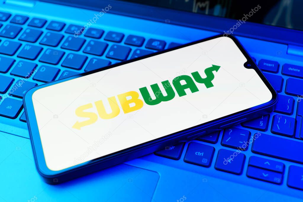 Prague, Czechia - 02 21 2025: Laptop on surface showing Subway logo.
