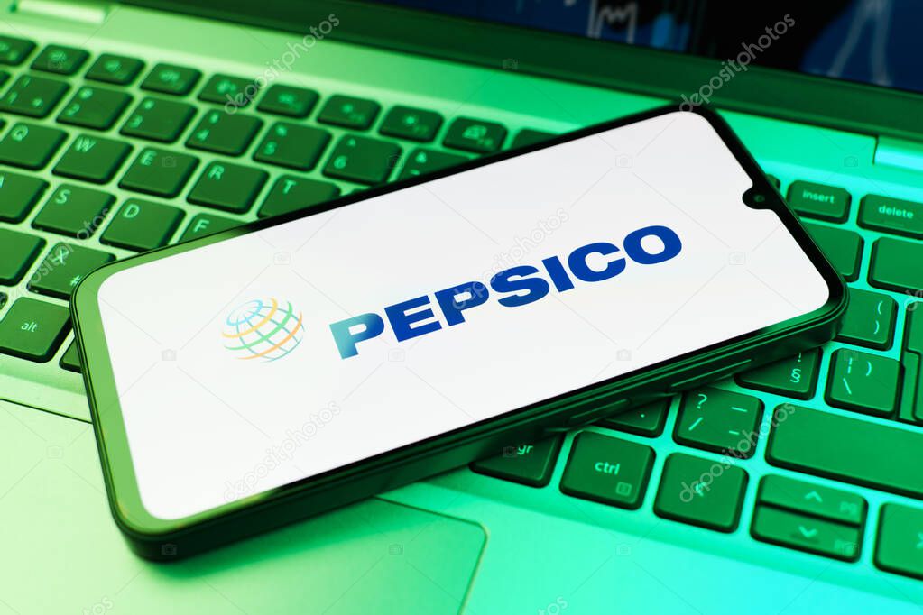 Prague, Czechia - 02 21 2025: Laptop on surface showing Pepsico logo.