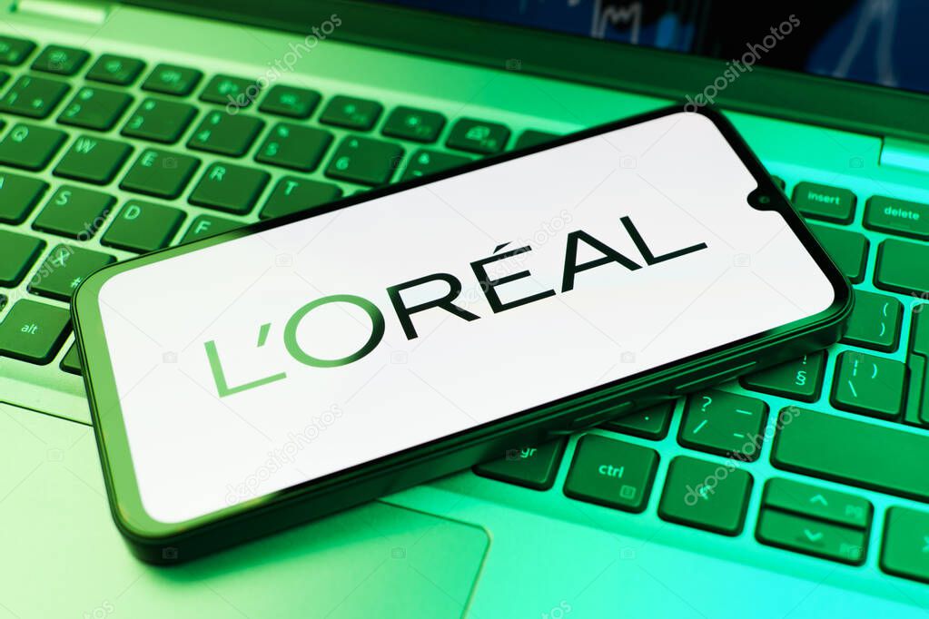 Prague, Czechia - 02 21 2025: Laptop on surface showing L'Oreal logo.
