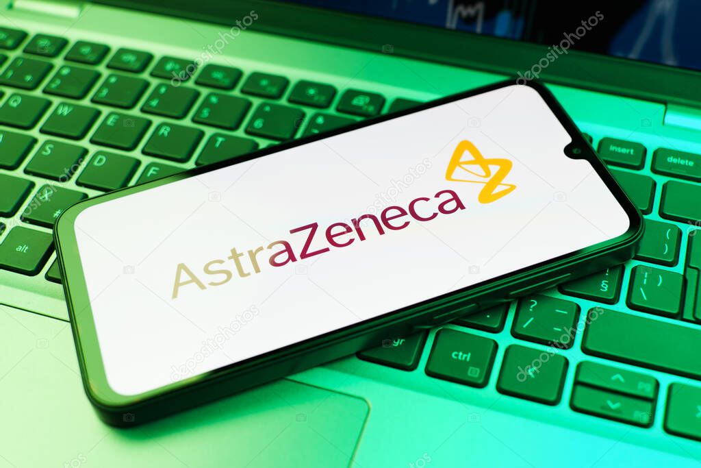 Prague, Czechia - 02 21 2025: Laptop on surface showing AstraZeneca logo.