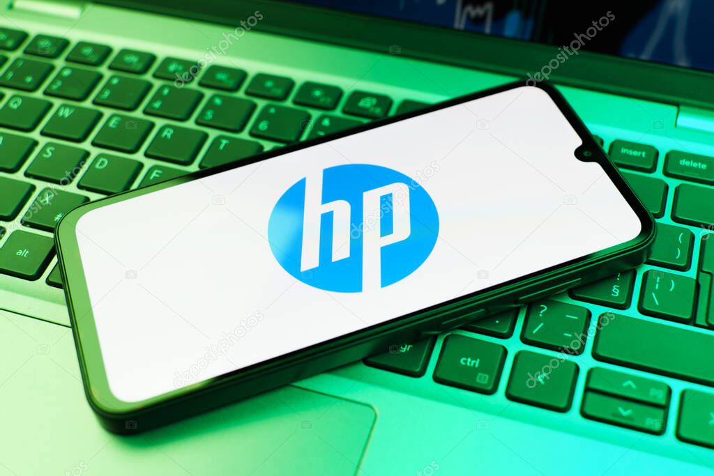 Prague, Czechia - 02 21 2025: Laptop on surface showing Hewlett-Packard logo.