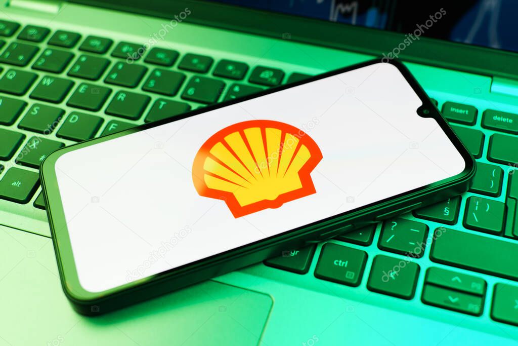 Prague, Czechia - 02 21 2025: Laptop on surface showing Shell logo.