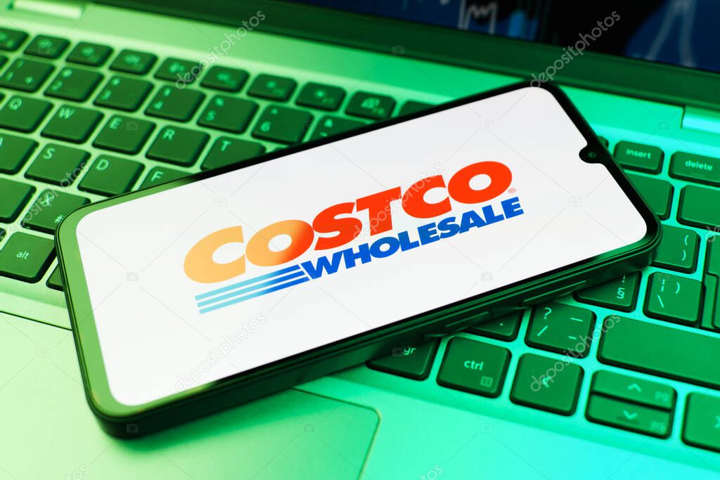 Prague, Czechia - 02 21 2025: Laptop on surface showing Costco logo.