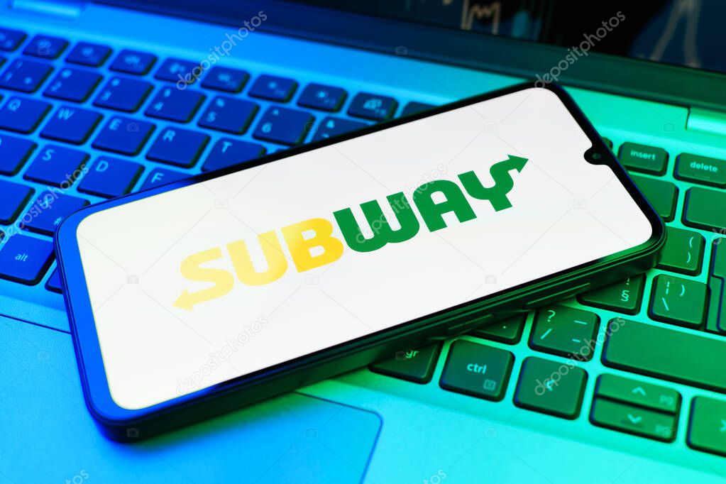 Prague, Czechia - 02 21 2025: Laptop on surface showing Subway logo.