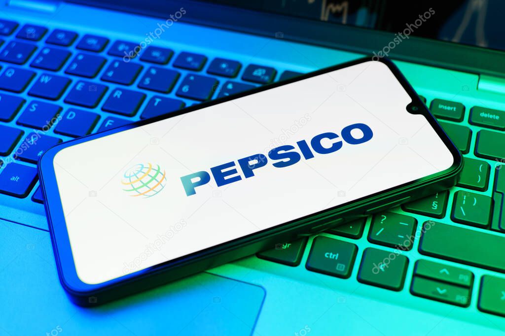 Prague, Czechia - 02 21 2025: Laptop on surface showing Pepsico logo.