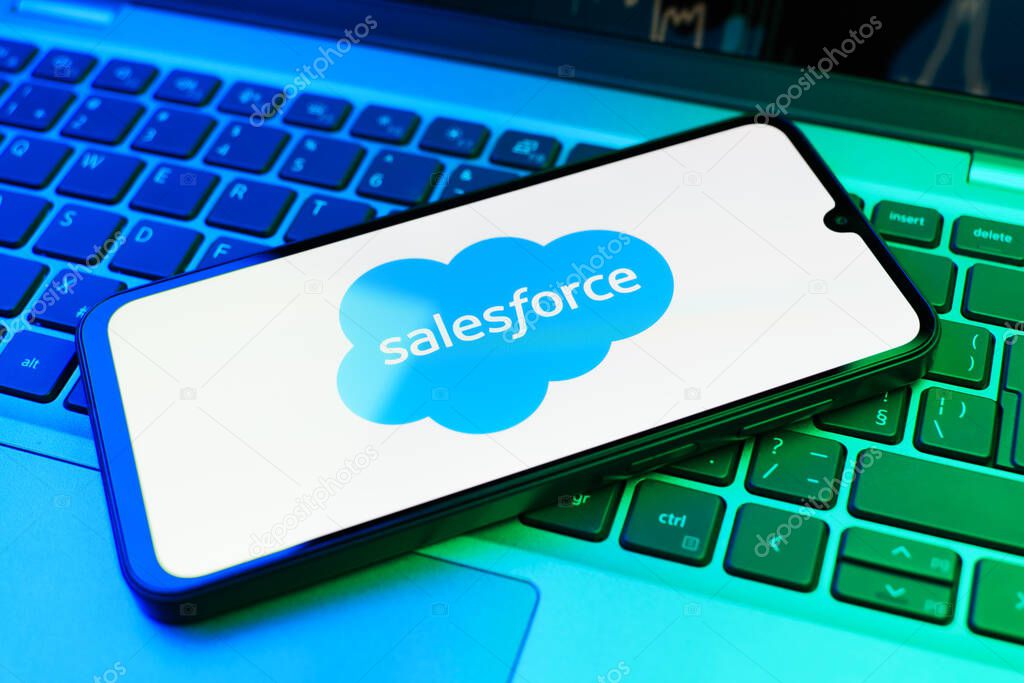 Prague, Czechia - 02 21 2025: Laptop on surface showing Salesforce logo.