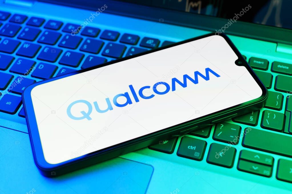 Prague, Czechia - 02 21 2025: Laptop on surface showing Qualcomm logo.