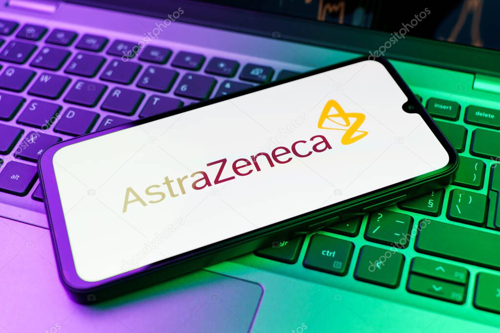 Prague, Czechia - 02 21 2025: Laptop on surface showing AstraZeneca logo.