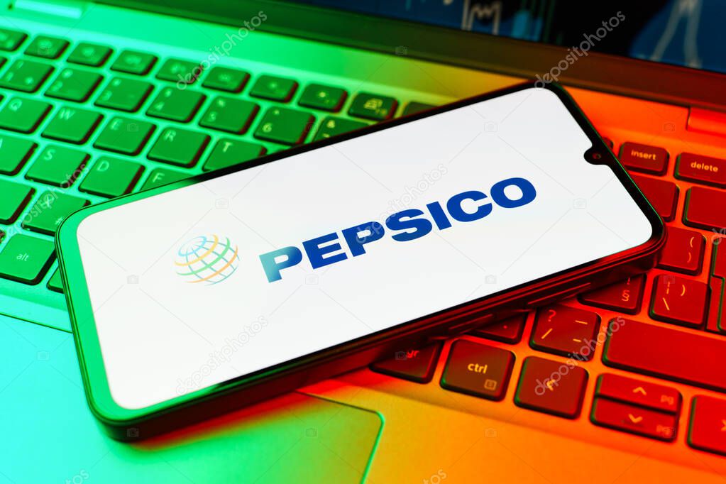 Prague, Czechia - 02 21 2025: Laptop on surface showing Pepsico logo.