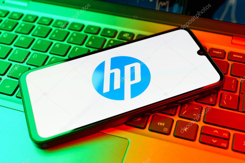 Prague, Czechia - 02 21 2025: Laptop on surface showing Hewlett-Packard logo.