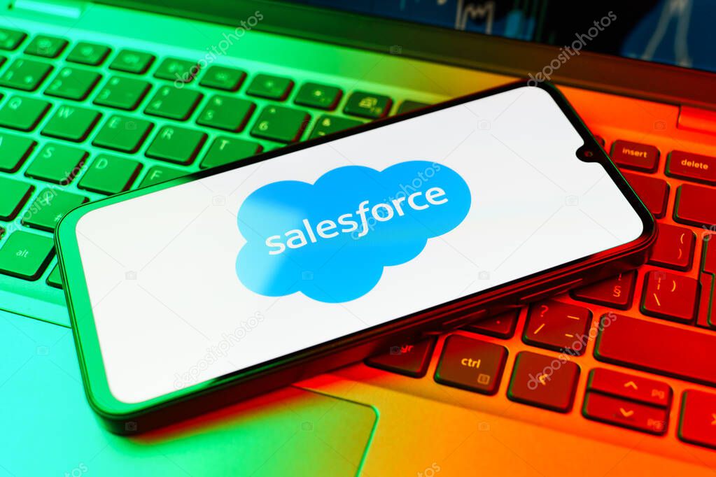 Prague, Czechia - 02 21 2025: Laptop on surface showing Salesforce logo.