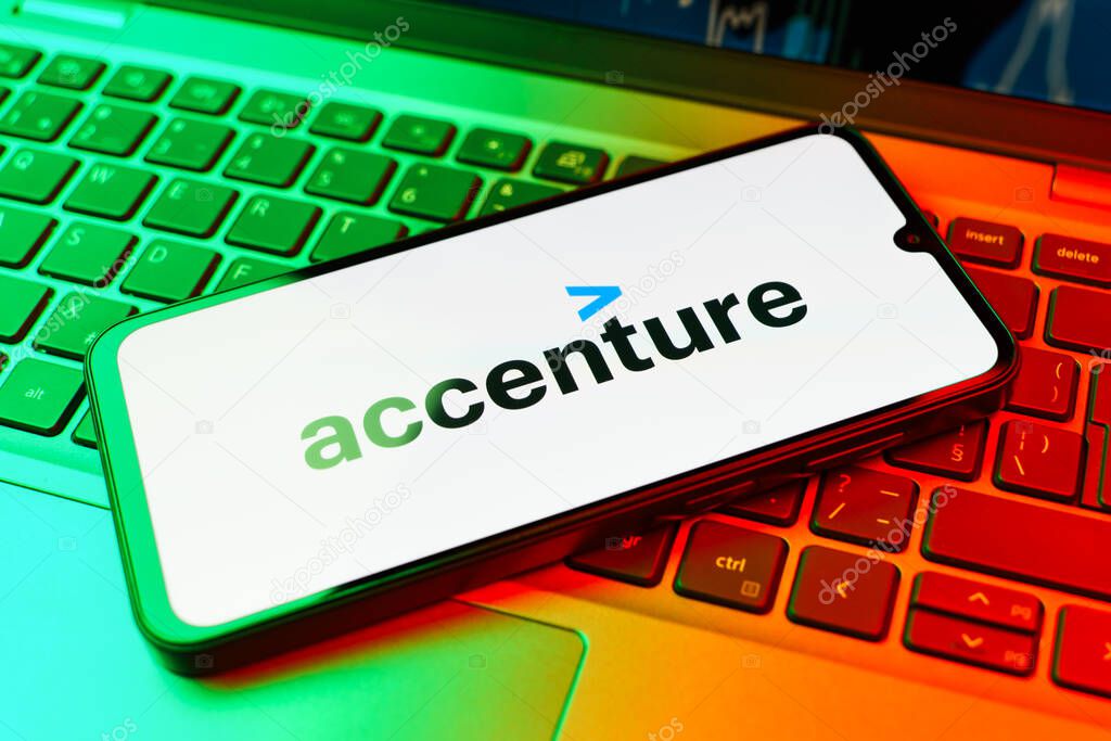 Prague, Czechia - 02 21 2025: Laptop on surface showing Accenture logo.
