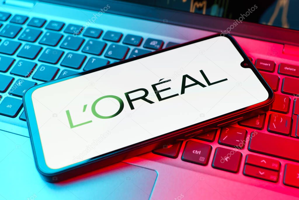 Prague, Czechia - 02 21 2025: Laptop on surface showing L'Oreal logo.