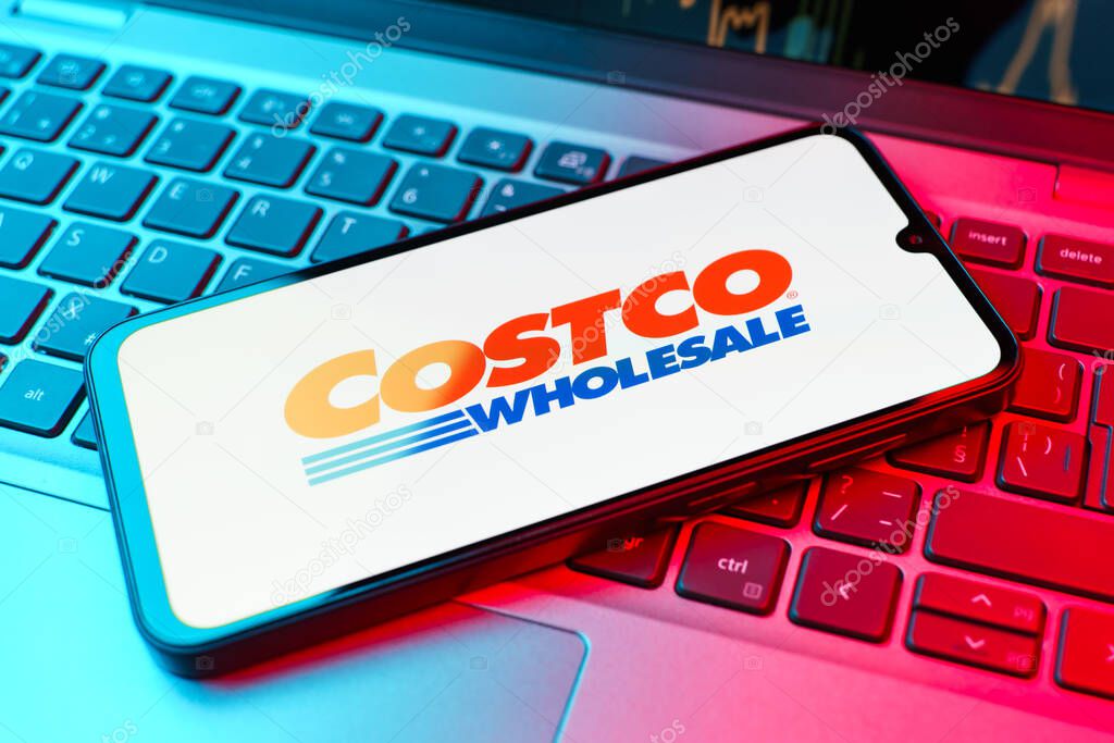 Prague, Czechia - 02 21 2025: Laptop on surface showing Costco logo.