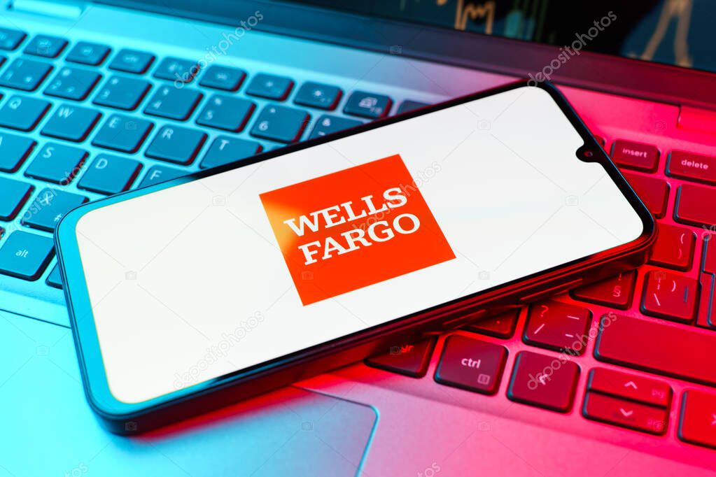 Prague, Czechia - 02 21 2025: Laptop on surface showing Wells Fargo logo.