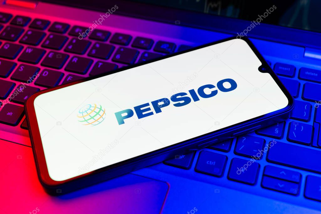 Prague, Czechia - 02 21 2025: Laptop on surface showing Pepsico logo.