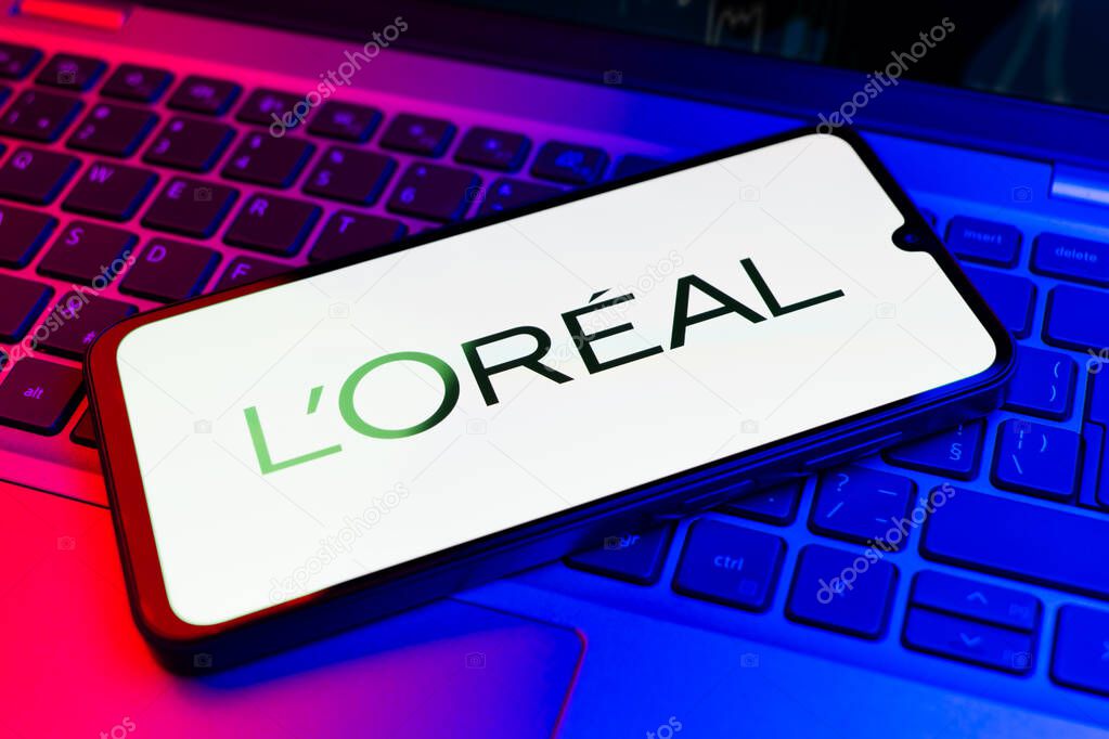 Prague, Czechia - 02 21 2025: Laptop on surface showing L'Oreal logo.