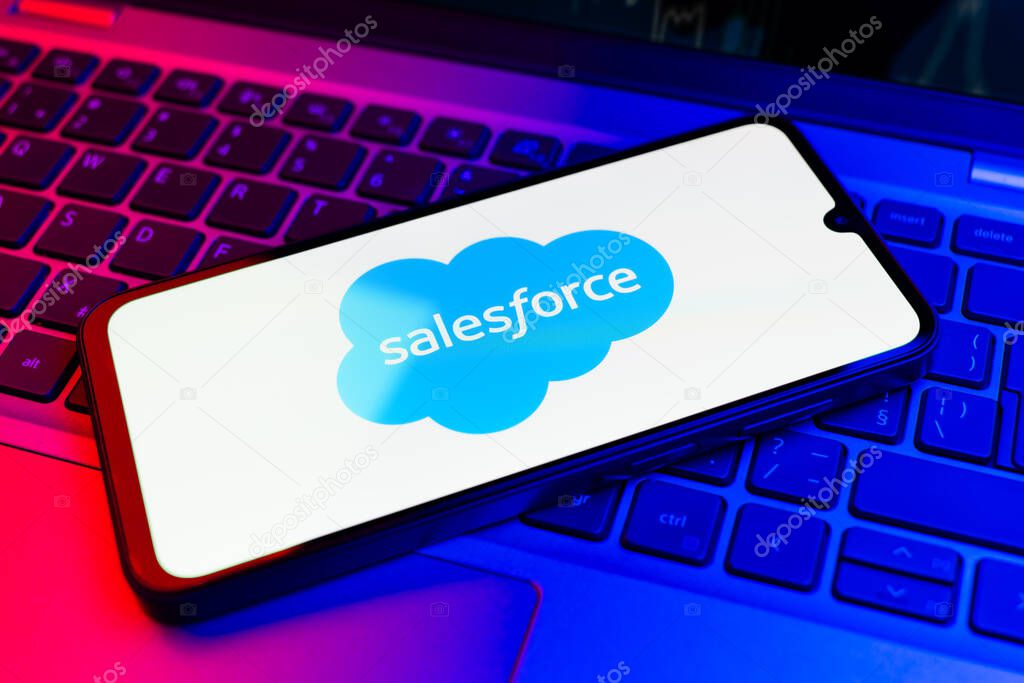 Prague, Czechia - 02 21 2025: Laptop on surface showing Salesforce logo.