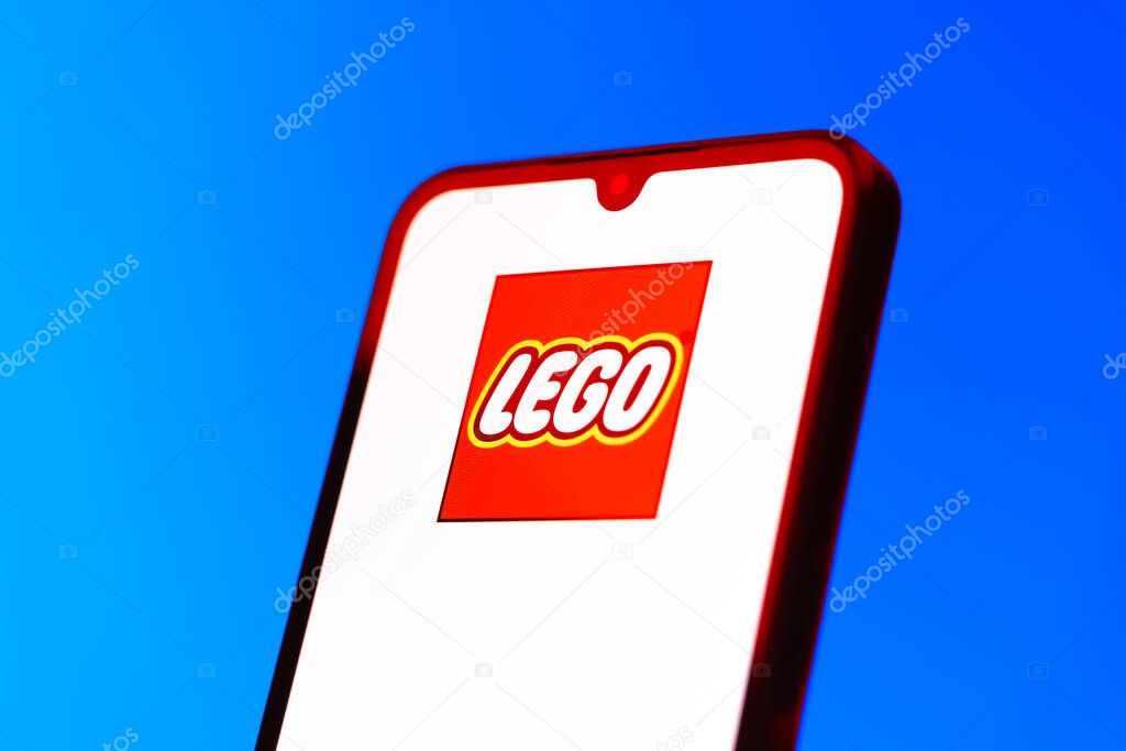 Prague, Czechia - 10 21 2024: Smartphone on surface showing Lego logo.