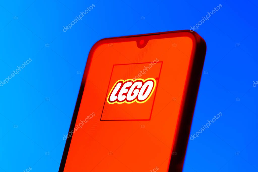 Prague, Czechia - 10 21 2024: Smartphone on surface showing Lego logo.