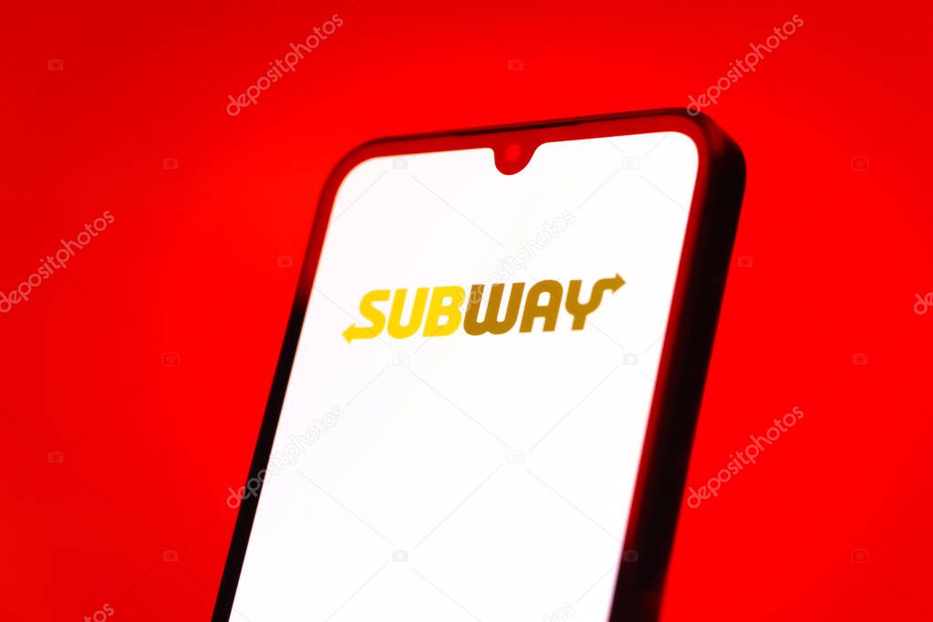 Prague, Czechia - 10 21 2024: Smartphone on surface showing Subway logo.