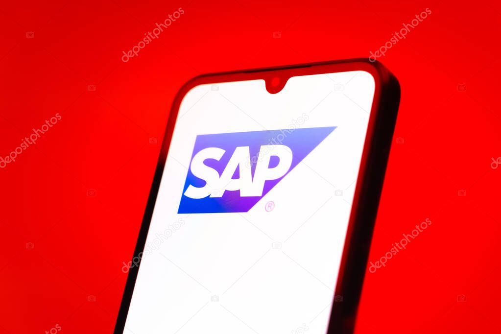 Prague, Czechia - 10 21 2024: Smartphone on surface showing SAP logo.