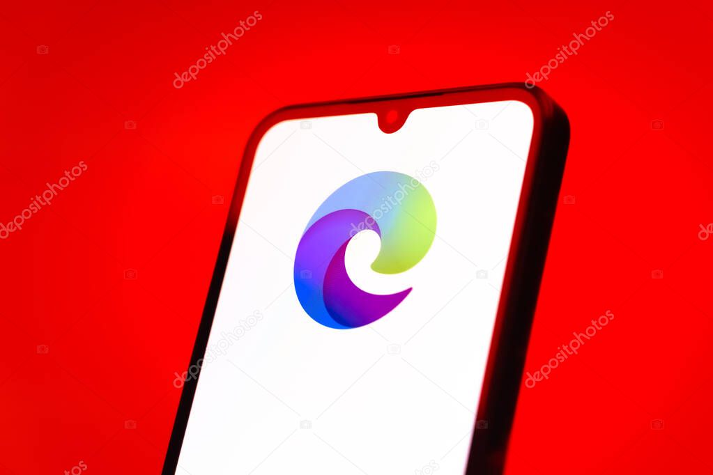 Prague, Czechia - 10 21 2024: Smartphone on surface showing Edge logo.