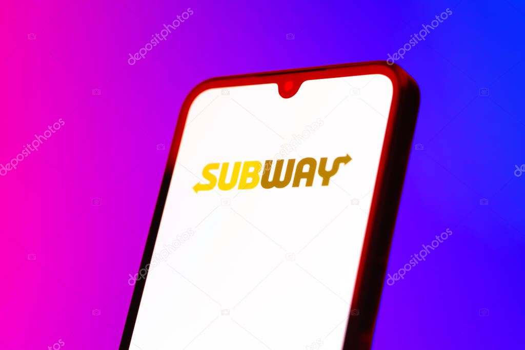 Prague, Czechia - 10 21 2024: Smartphone on surface showing Subway logo.