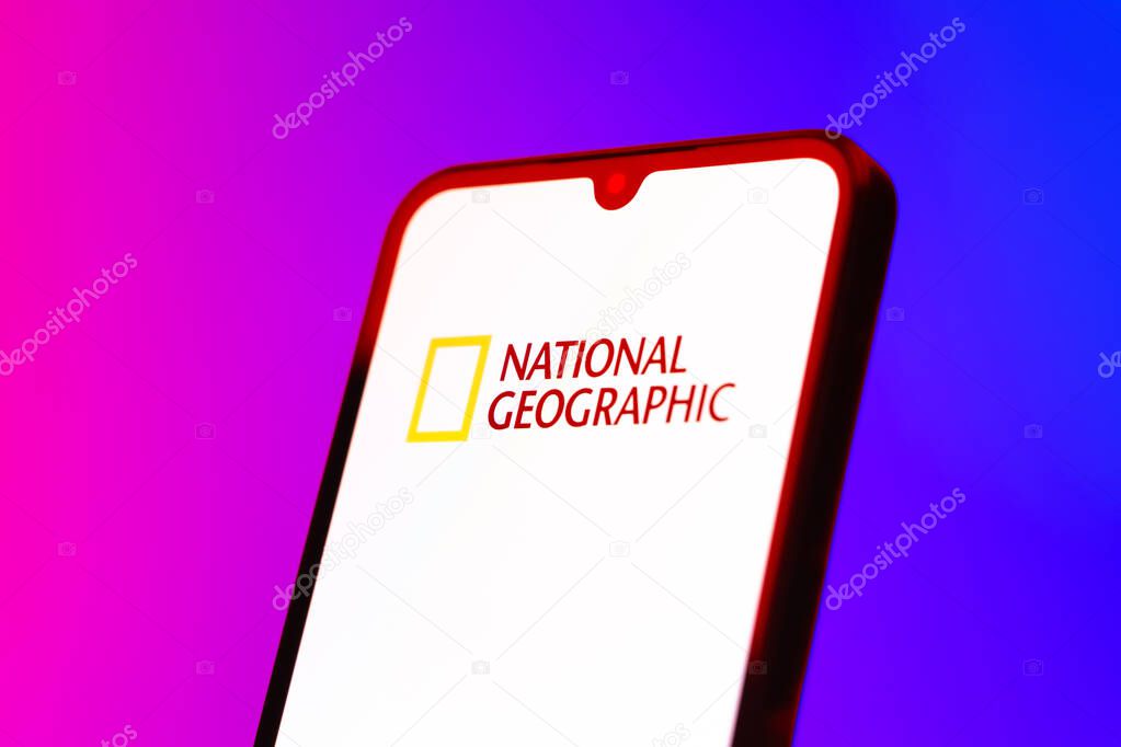 Prague, Czechia - 10 21 2024: Smartphone on surface showing National Geographic logo.
