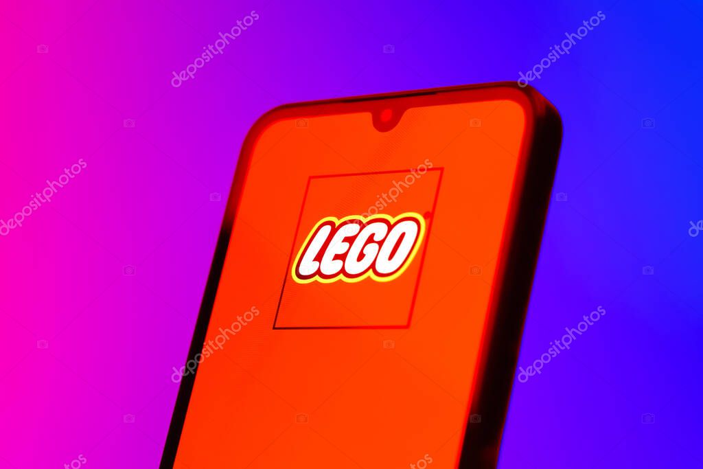 Prague, Czechia - 10 21 2024: Smartphone on surface showing Lego logo.
