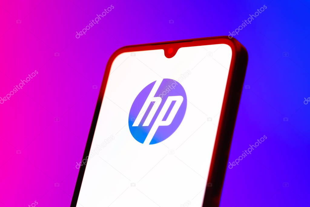 Prague, Czechia - 10 21 2024: Smartphone on surface showing Hewlett-Packard logo.