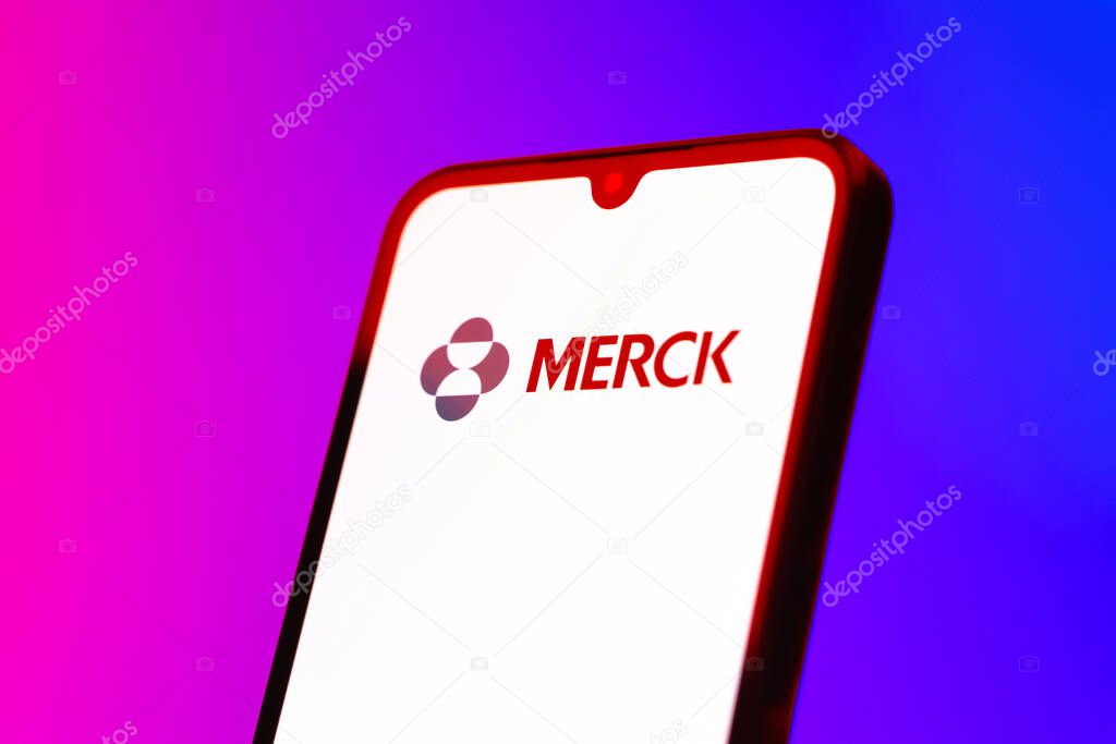 Prague, Czechia - 10 21 2024: Smartphone on surface showing Merck logo.