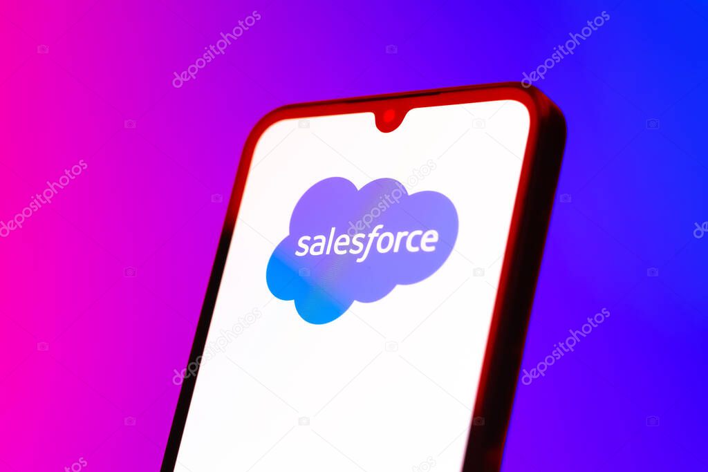 Prague, Czechia - 10 21 2024: Smartphone on surface showing Salesforce logo.