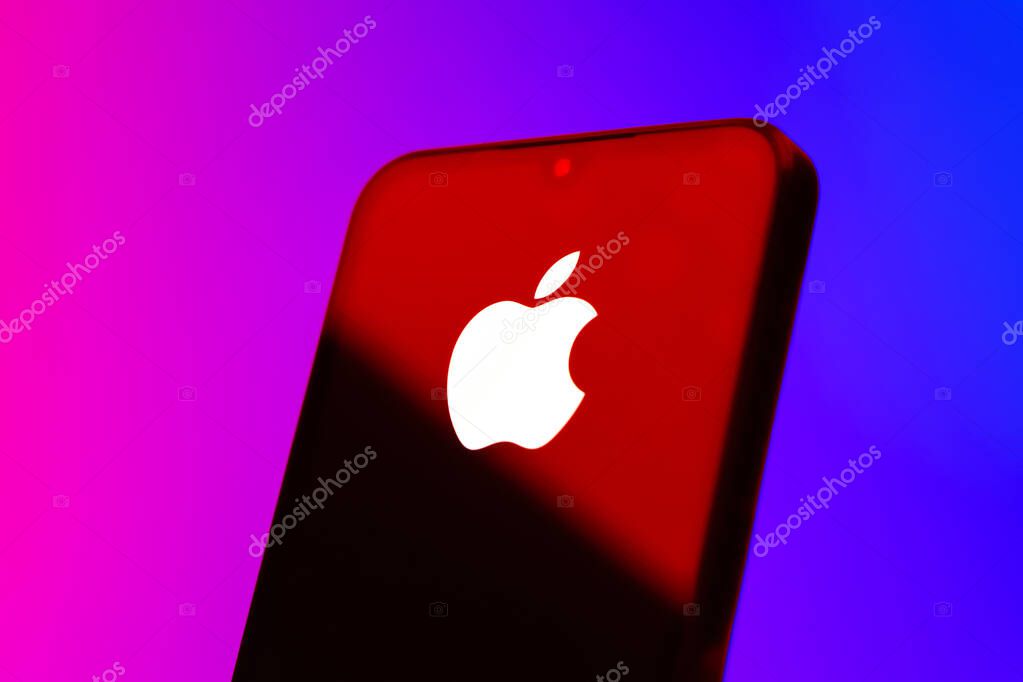 Prague, Czechia - 10 21 2024: Smartphone on surface showing Apple logo.
