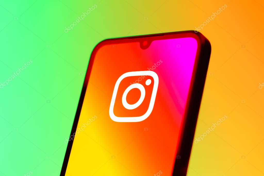 Prague, Czechia - 10 21 2024: Smartphone on surface showing Instagram logo.