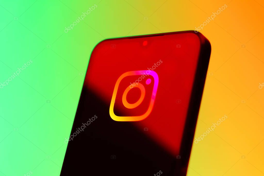 Prague, Czechia - 10 21 2024: Smartphone on surface showing Instagram logo.