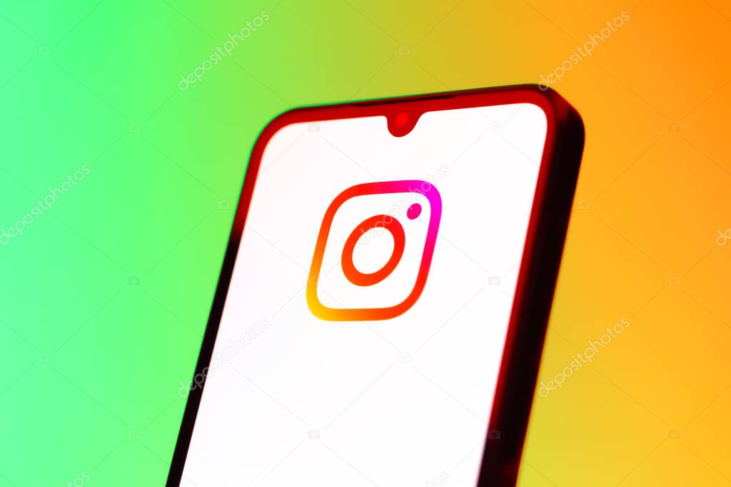 Prague, Czechia - 10 21 2024: Smartphone on surface showing Instagram logo.