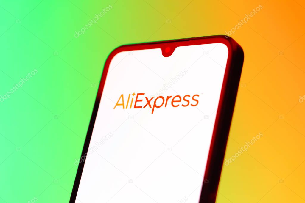 Prague, Czechia - 10 21 2024: Smartphone on surface showing AliExpress logo.