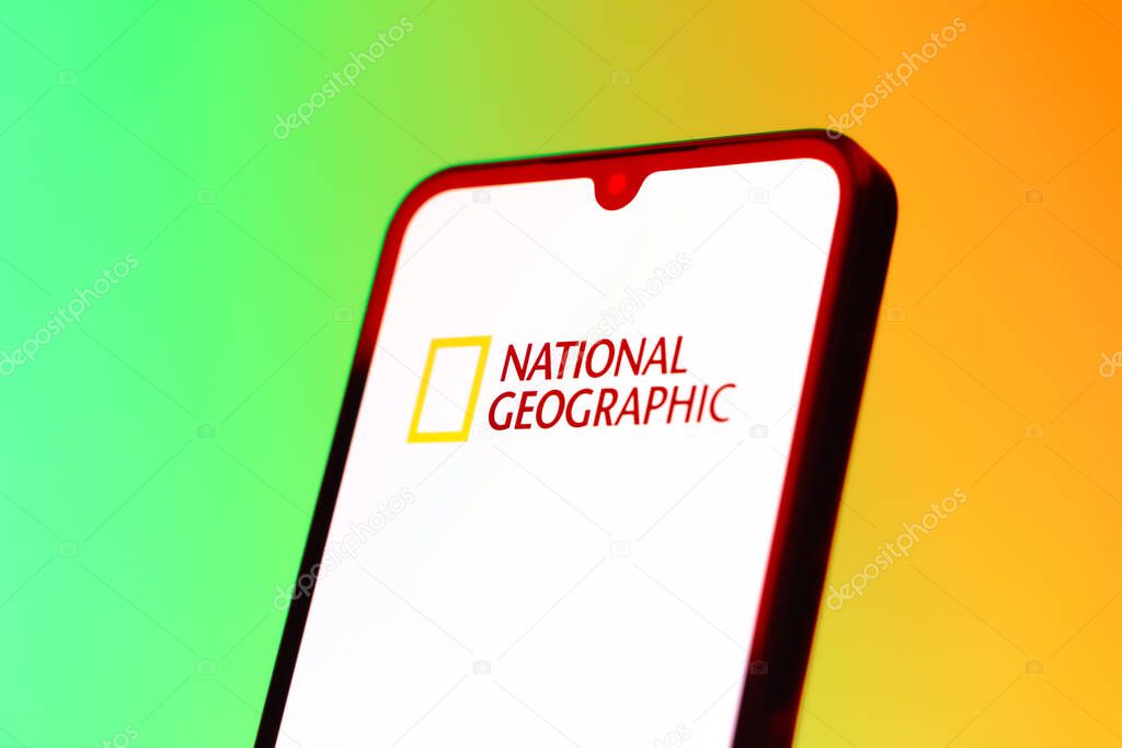 Prague, Czechia - 10 21 2024: Smartphone on surface showing National Geographic logo.