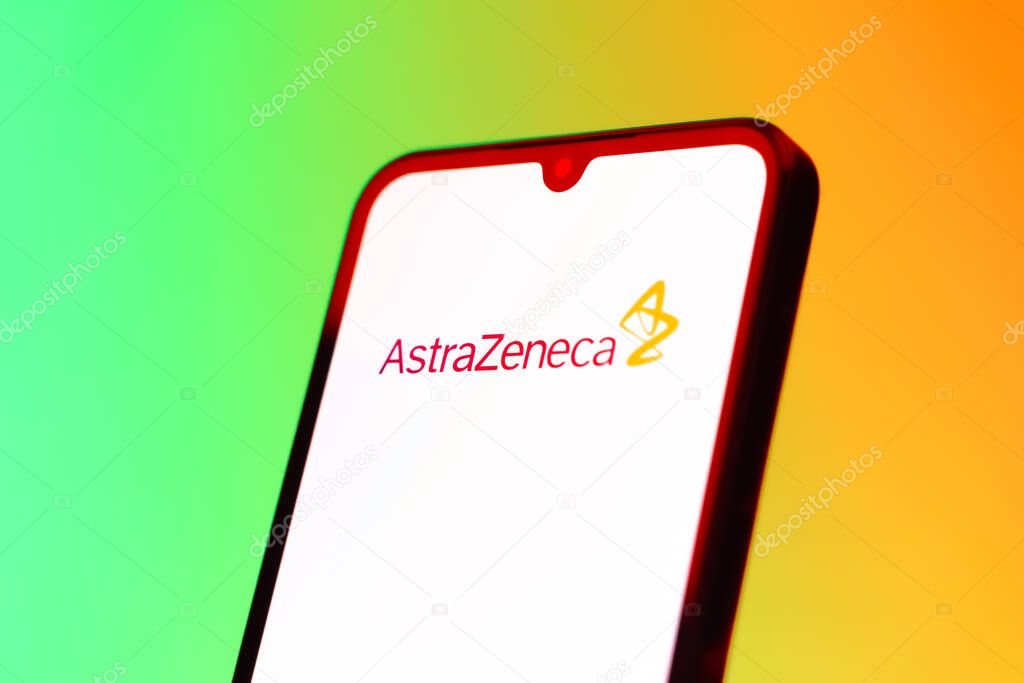Prague, Czechia - 10 21 2024: Smartphone on surface showing AstraZeneca logo.