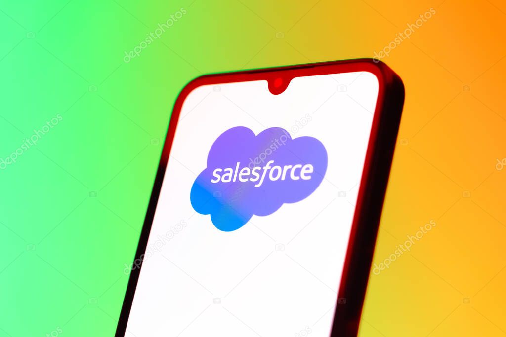 Prague, Czechia - 10 21 2024: Smartphone on surface showing Salesforce logo.