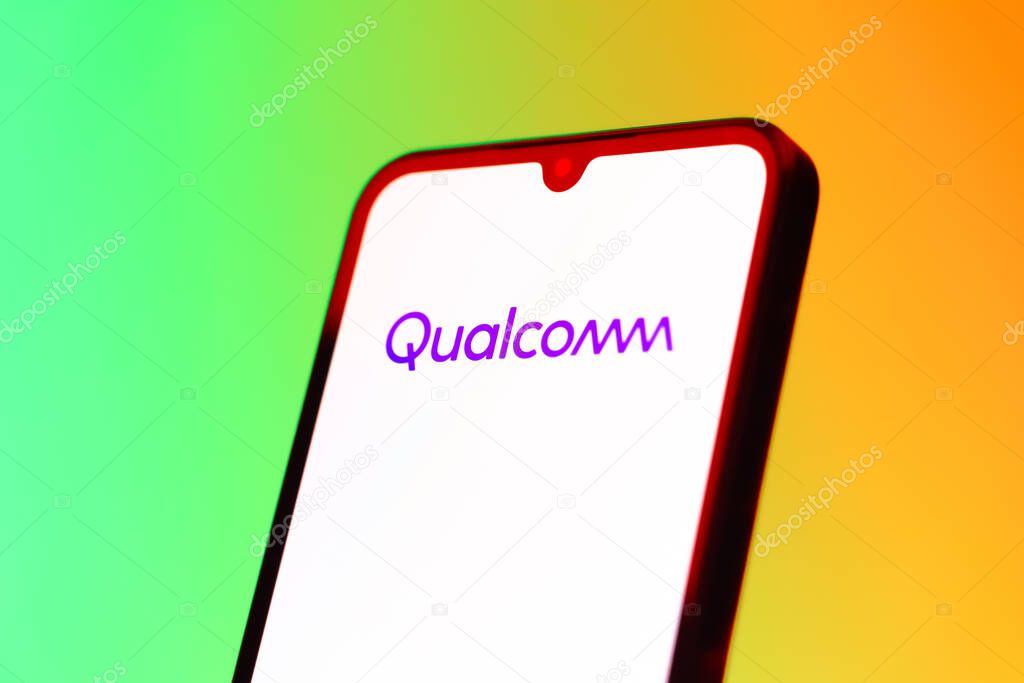 Prague, Czechia - 10 21 2024: Smartphone on surface showing Qualcomm logo.