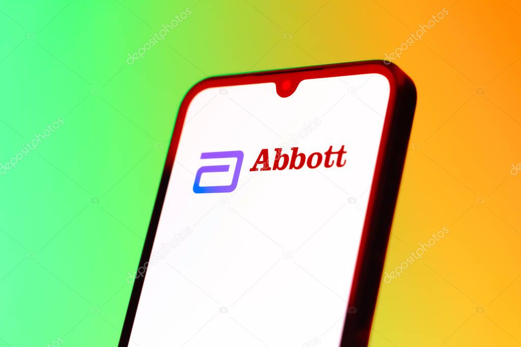 Prague, Czechia - 10 21 2024: Smartphone on surface showing Abbott Laboratories logo.