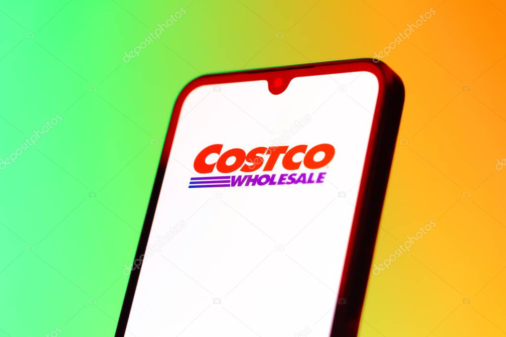 Prague, Czechia - 10 21 2024: Smartphone on surface showing Costco logo.