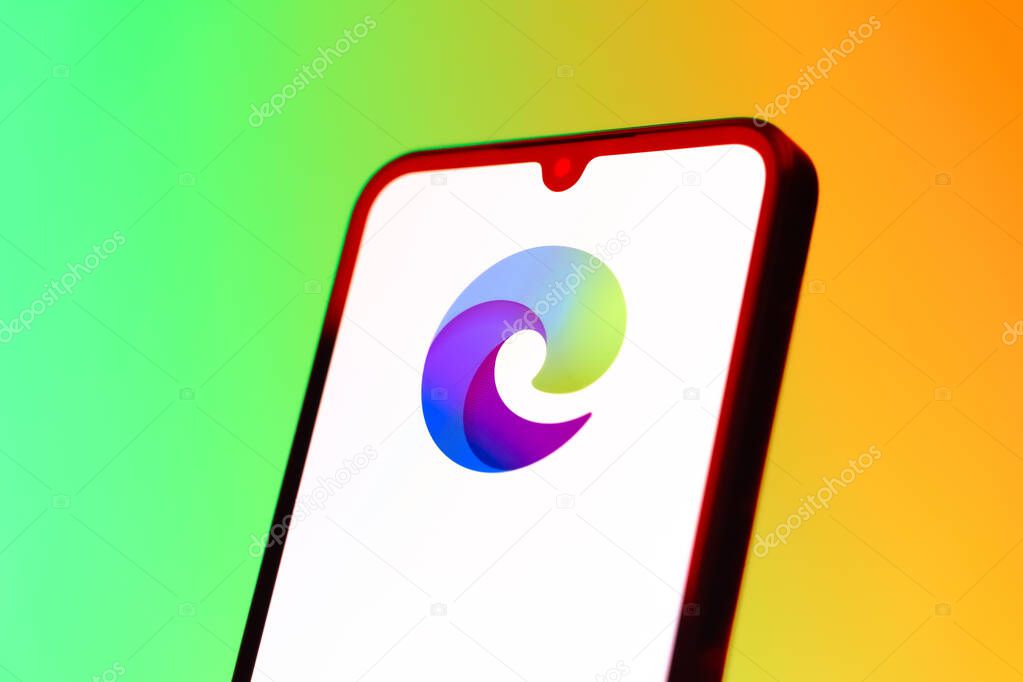 Prague, Czechia - 10 21 2024: Smartphone on surface showing Edge logo.