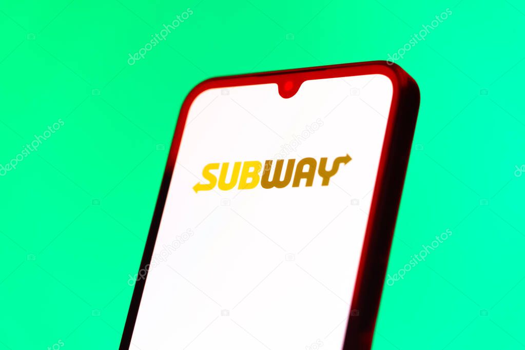 Prague, Czechia - 10 21 2024: Smartphone on surface showing Subway logo.